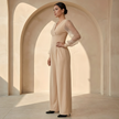 Women’s V neck mesh sleeve evening jumpsuit by FJØRNA, featuring a stylish V-neckline and sheer mesh sleeves.