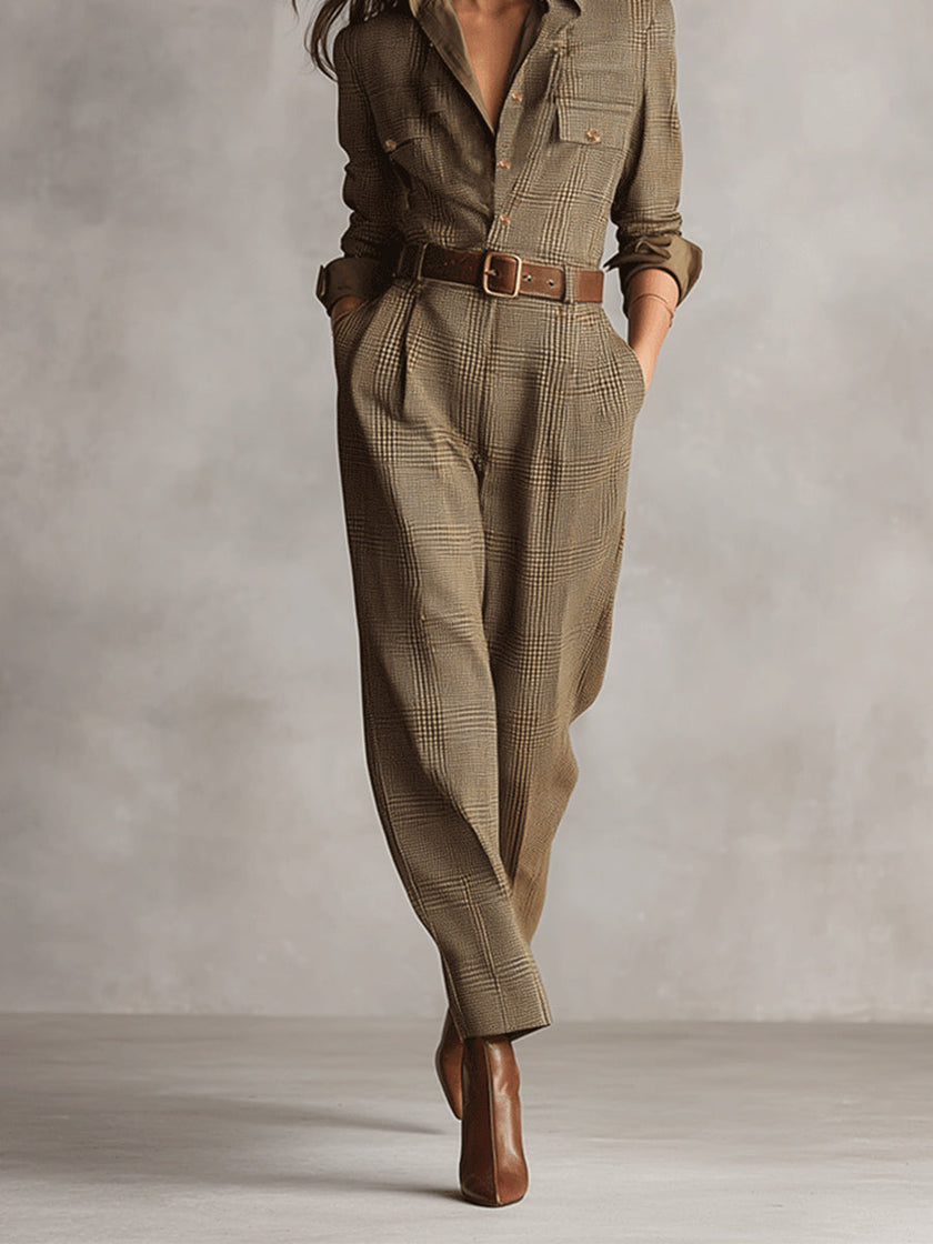 FJØRNA women's plaid jumpsuit with tweed texture, collared V-neck, utility pockets, and tailored pants style.
