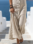 FJØRNA women's sleeveless summer maxi dress with a flowy, casual design and vibrant print, perfect for warm weather.