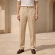 Men's linen straight-leg trousers by FJØRNA with relaxed fit and striped pattern, shown in a natural casual pose.