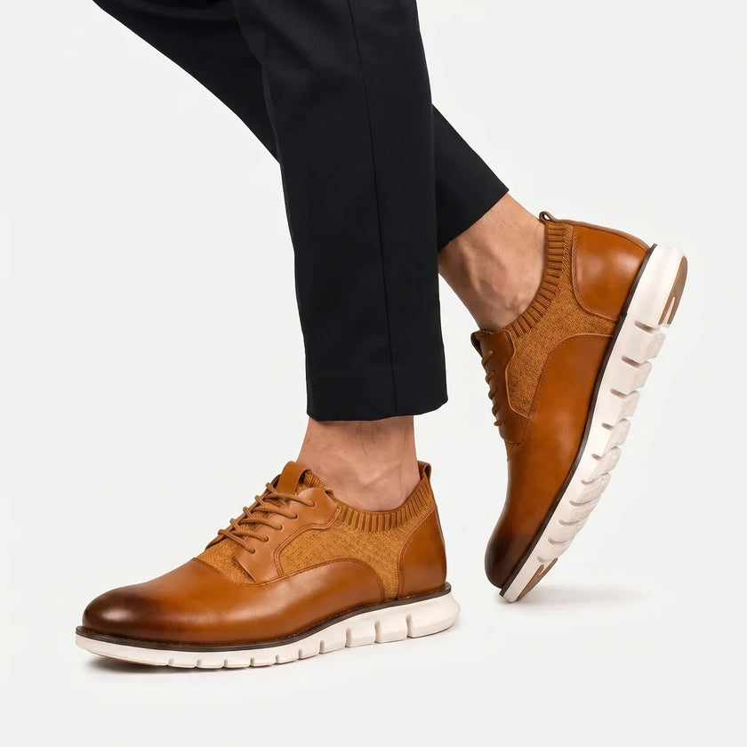 Men's leather lace-up dress shoes by FJØRNA, featuring polished black leather, sleek design, and classic style.