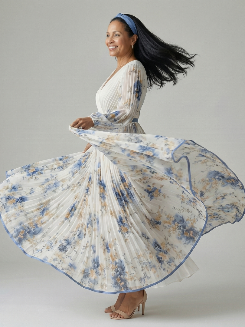 FJØRNA women's floral summer midi dress with long sleeves, lightweight fabric, and a flowing silhouette for warm weather.