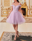 FJØRNA champagne tulle cocktail dress for women, off-shoulder design with elegant, flowing fabric and stylish details.