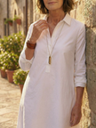 Flowy lightweight summer dress for women by FJØRNA with pockets, perfect for warm weather and casual outings.