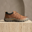 Red leather men's orthopedic shoes by FJØRNA with sturdy soles and supportive design, suitable for comfortable everyday wear.