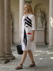 FJØRNA women's summer dress with colorful print and pockets, lightweight and casual for warm weather wear.