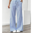 FJØRNA lightweight summer women's trousers with drawstring waist, pockets, and breathable fabric, ideal for warm weather.