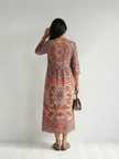 FJØRNA summer midi dress for women featuring long sleeves, a wrap design, flowy relaxed fit, ideal for warm weather.