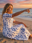 FJØRNA floral summer midi dress for women with short sleeves and wrap style, casual and perfect for warm weather.
