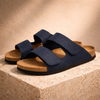 Men's red FJØRNA cushioned sandals with open toes and adjustable straps, designed for comfort and casual wear.
