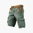 Men's FJØRNA cargo shorts with multiple functional pockets and ample storage, shown in a casual 3/4 length style.