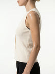 Close-up of FJØRNA women's sleeveless tailored waistcoat, showing structured layering and refined stitching details.
