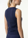 Close-up of FJØRNA women's sleeveless structured waistcoat with tailored layering, showcasing detailed stitching and fabric texture.