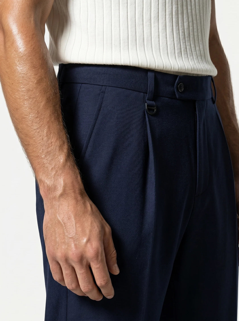 Close-up of men's straight fit trousers by FJØRNA showing tailored fabric and classic design in a neutral color.