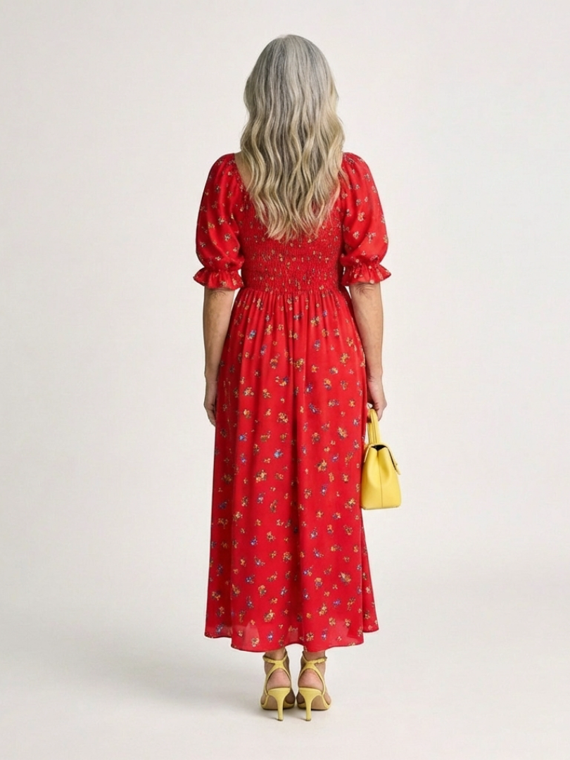 FJØRNA women's summer midi dress with floral print, square neckline, puff sleeves, and a flowing silhouette.