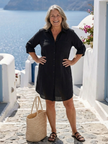 FJØRNA women's summer dress featuring long sleeves and a slit, casual style perfect for warm weather.