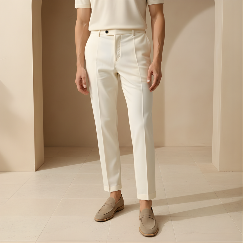 Men's relaxed fit straight leg trousers by FJØRNA, shown in a neutral color, with a tailored waistband and classic pant silhouette.