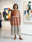 FJØRNA women's summer midi dress with striped pattern, long sleeves, flowy fabric, perfect for warm weather and casual occasions.