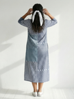 FJØRNA women's summer midi dress with long sleeves, wrap design, flowy and breathable fabric, perfect for warm weather.