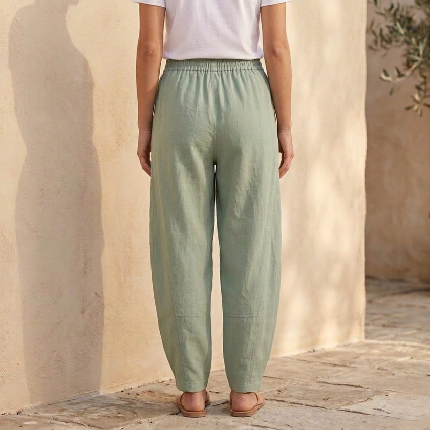 Women’s cotton linen wide-leg trousers by FJØRNA, relaxed fit pants with flowy, breathable fabric and a stylish silhouette.