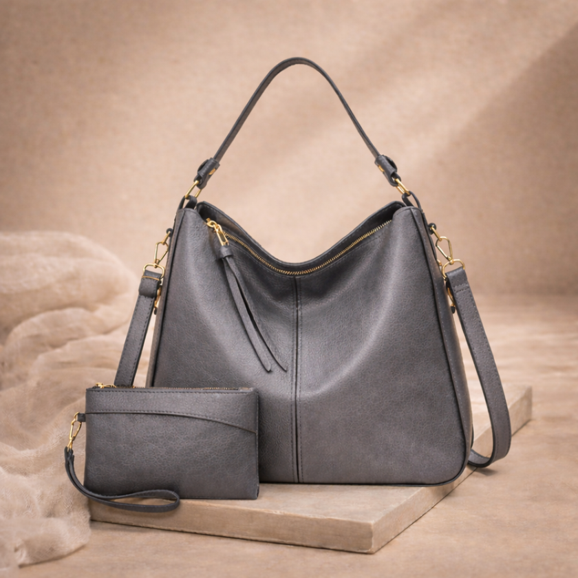 FJØRNA faux leather hobo shoulder bag for women, vegan leather tote with adjustable strap and spacious interior.