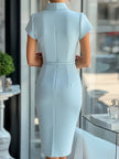 FJØRNA sky blue asymmetrical dress with belt, stylish women's dress featuring a modern silhouette and elegant design.