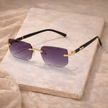 FJØRNA unisex retro sunglasses with rounded frames and dark lenses, stylish accessories for men and women.