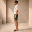 Men's FJØRNA corduroy shorts with drawstring waist, shown in a casual fit with front pockets and textured fabric.