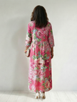 FJØRNA women's floral summer midi dress with long sleeves, flowy fabric, and a relaxed fit for warm weather.