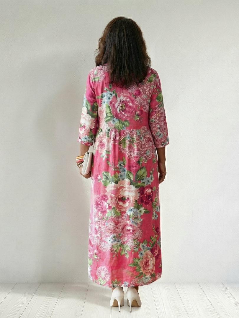 FJØRNA women's floral summer midi dress with long sleeves, flowy fabric, and a relaxed fit for warm weather.