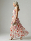 FJØRNA women's floral summer maxi dress with halter neck, sleeveless, flowy design perfect for warm weather.
