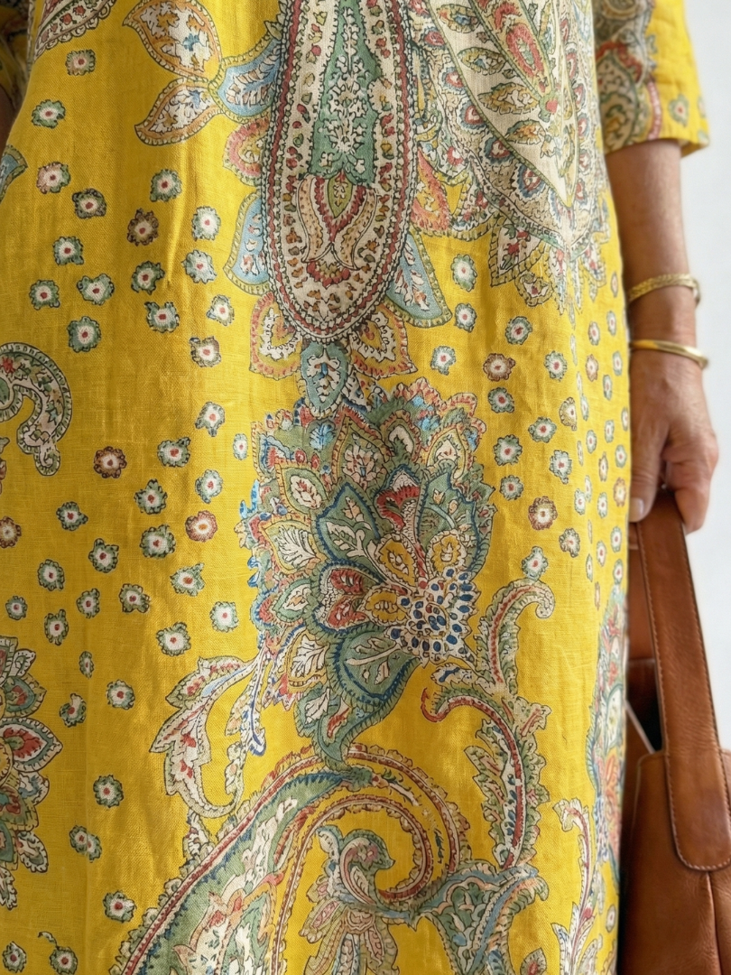 FJØRNA women's summer midi dress with paisley pattern and long sleeves, stylish and comfortable for warm weather wear.