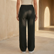 Women’s lightweight cotton wide-leg trousers by FJØRNA, casual pants with relaxed fit and flowing wide-leg design.