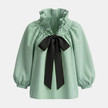 FJØRNA oversized long sleeve top for women, relaxed fit, soft fabric, in a neutral color, casual style for everyday wear.