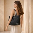 FJØRNA women's school tote bag with spacious design and sturdy handles, ideal for carrying books and daily essentials.