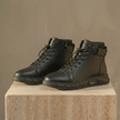 FJØRNA men's leather orthopedic boots with side zip, featuring sturdy design and comfortable fit for everyday wear.