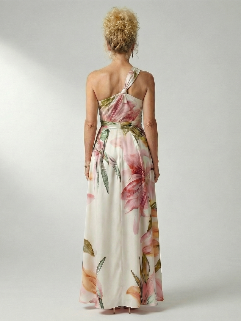 FJØRNA women's floral summer maxi dress with halter neck and sleeveless design, perfect for warm weather and outdoor occasions.