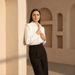 Men's FJØRNA shirt, casual top with a classic fit and button-down design, shown in a neutral color.