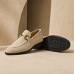 FJØRNA men's suede slip-on loafers with sleek design and stitching details, perfect for casual or dressy occasions.