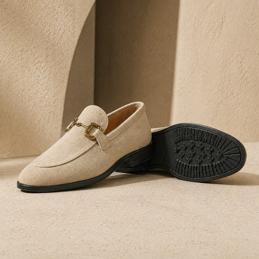 FJØRNA men's suede slip-on loafers with sleek design and stitching details, perfect for casual or dressy occasions.