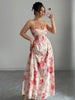White sleeveless V-neck corset gown from FJØRNA featuring a long, elegant maxi dress design.