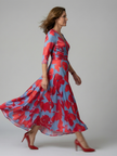 FJØRNA women's floral summer maxi dress with long sleeves, wrap style, flowy fabric, perfect for warm weather.