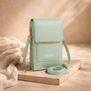 FJØRNA women's anti-theft travel crossbody bag with secure zipper and adjustable strap, designed for convenient travel and everyday use.