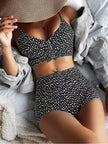FJØRNA women's printed tankini set with flattering fit, featuring colorful pattern and supportive swimwear design.