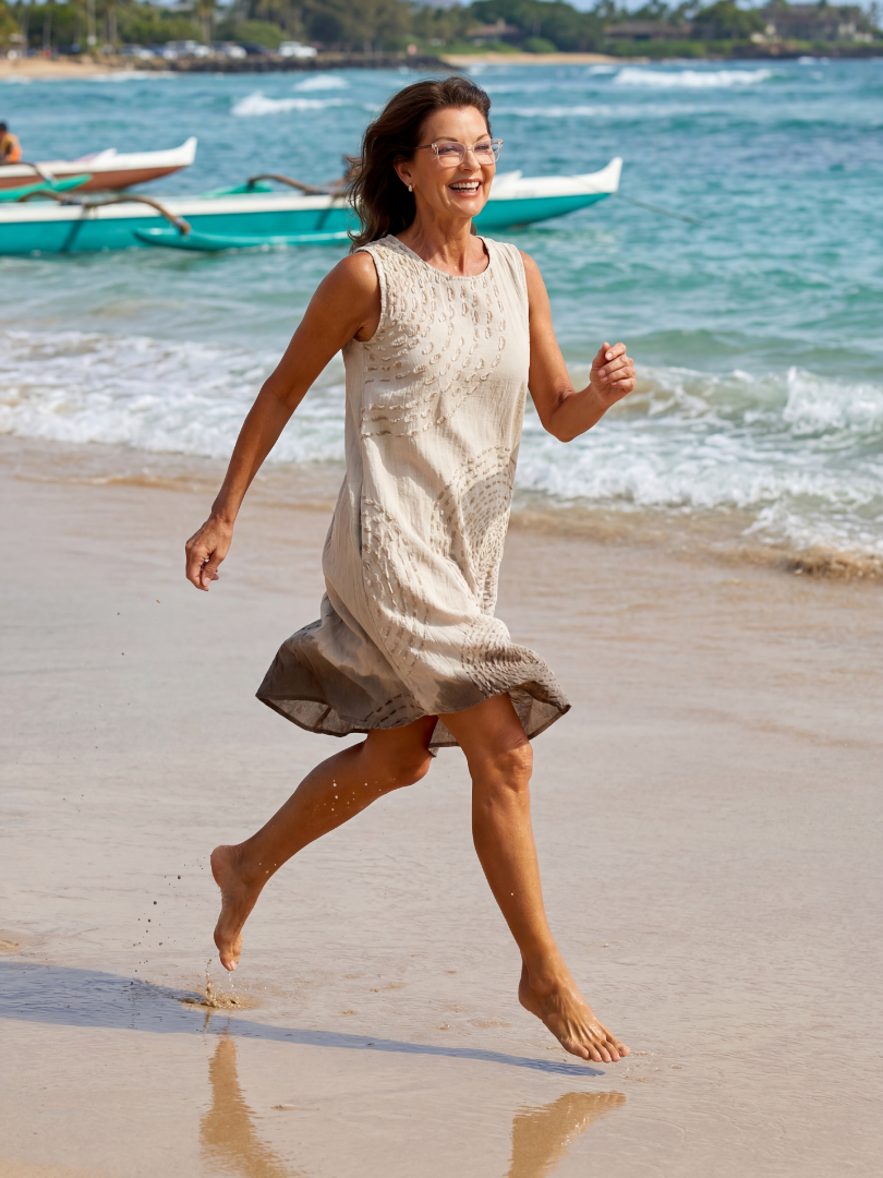 Flowy, lightweight summer midi dress for women by FJØRNA, breathable fabric, perfect for warm weather and casual occasions.