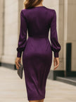 FJØRNA deep purple satin wrap midi dress for women, showcasing a sleek, elegant design with long sleeves and a fitted waist.