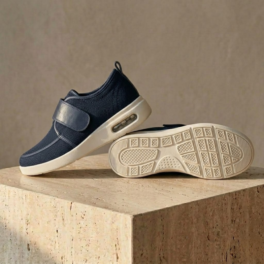 Red mesh FJØRNA men's breathable trainer shoes with velcro straps, designed for comfort and athletic wear.