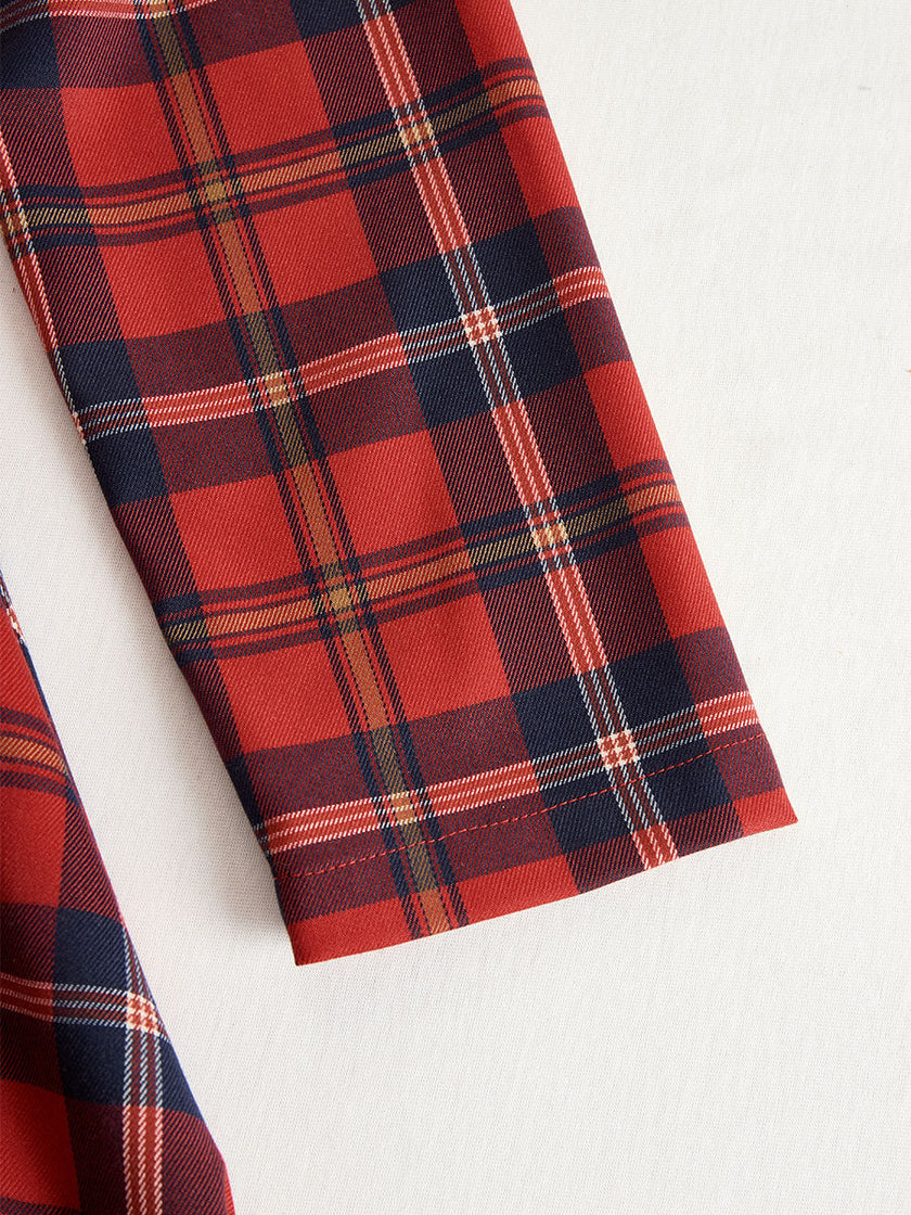 FJØRNA elegant long sleeve plaid dress with a classic yet modern design, featuring a fitted waist and stylish pattern.
