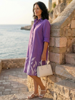 Elegant floral wrap evening dress for women by FJØRNA, featuring a stylish design perfect for formal occasions.