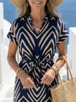 FJØRNA women's summer midi dress with geometric patterns and short sleeves, stylish and lightweight for warm weather.